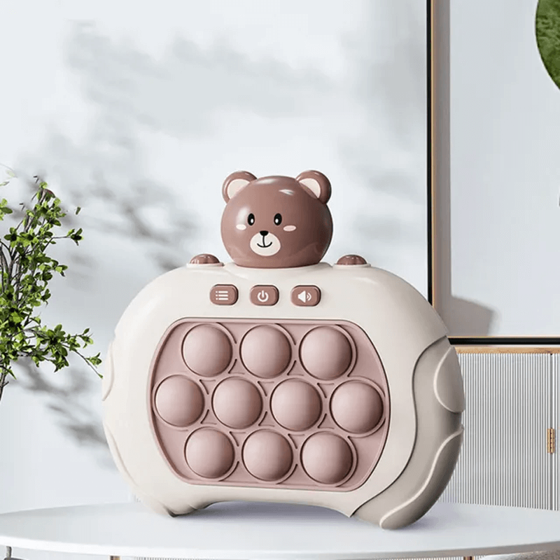 Pop It Quick Press Spelmachine