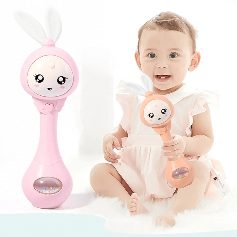Baby's muziek knipperende rammelaar