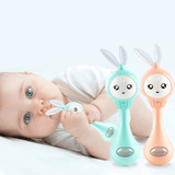 Baby's muziek knipperende rammelaar