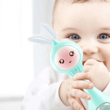 Baby's muziek knipperende rammelaar