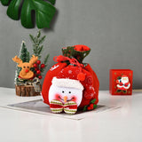 4x Gebreide kerstcadeauzakjes, 3D poppetjes, Kerstman, Sneeuwpop, Eland, IJsbeer